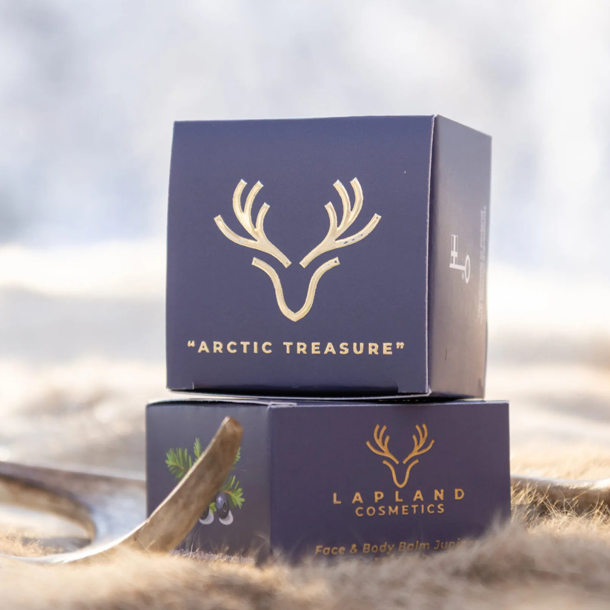 Lapland Cosmetics Juniper Face and Body Balm packaging with reindeer logo.